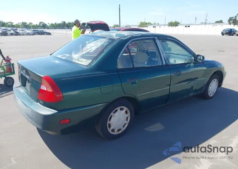 2000 Mitsubishi Mirage De z USA, uszkodzony, nr VIN JA3AY26C1YU012087